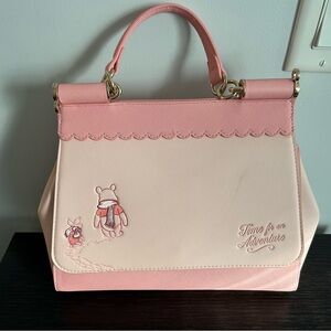 Lounge Fly Winnie the Pooh and Piglet handbag.